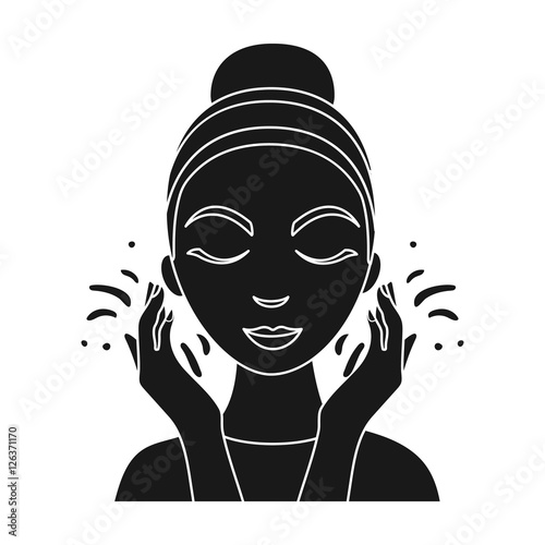 Face washing icon in black style isolated on white background. Skin care symbol stock vector illustration.