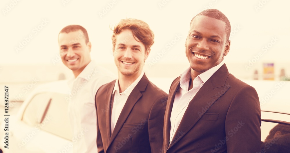 Portrait of men posing leaning on limousine Portrait of men posing leaning on limousine