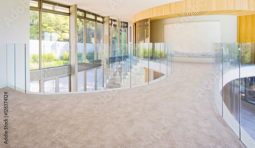 Photography Glass wall in the office building. Modern sunny empty loft room