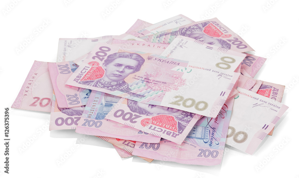 Pile of Ukrainian money in denomination 200 UAH. isolated.