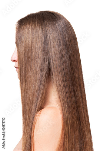 Woman with long straight hair, manicured side isolated on white.
