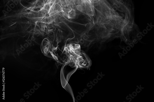 Abstract background. Movement of smoke with background is dark.