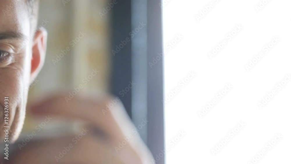 happy young man with smartphone playing game happy young man with smartphone playing game