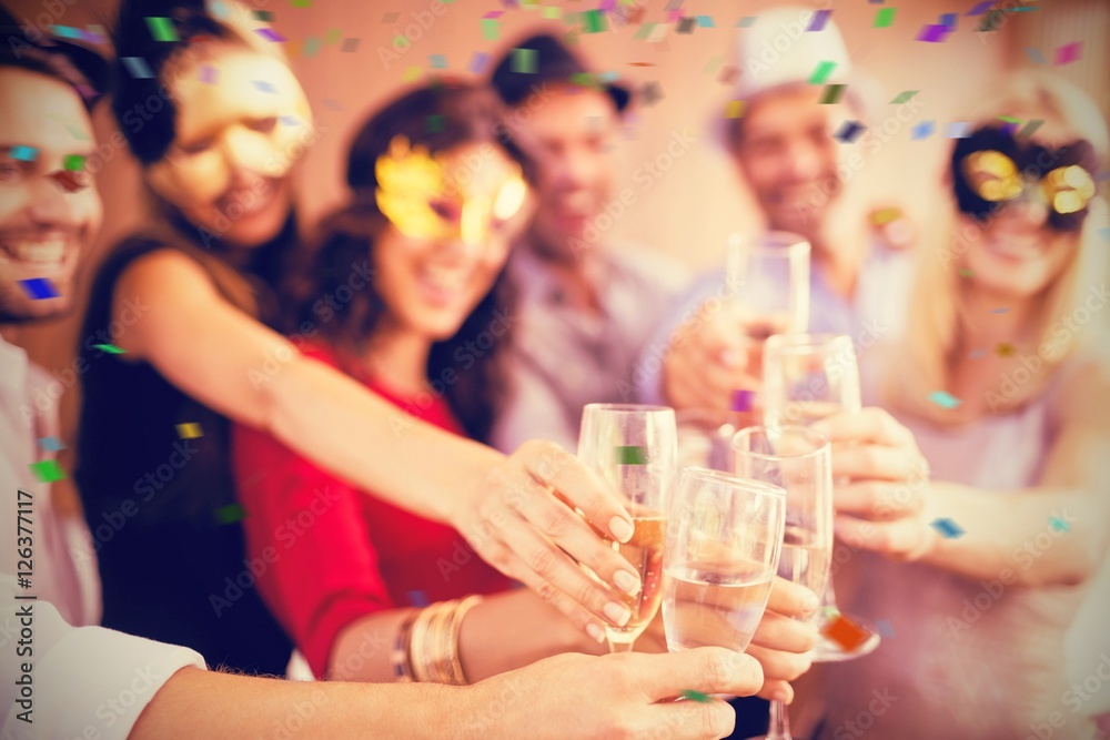 Composite image of cropped image of hands holding champagne flut Composite image of cropped image of hands holding champagne flut