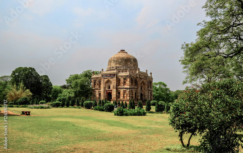 View of the tomb of the Mughal period, Sheesh Gumbad, a monument to Indian architecture of the 15th century in the Lodi Garden Park in New Delhi, India