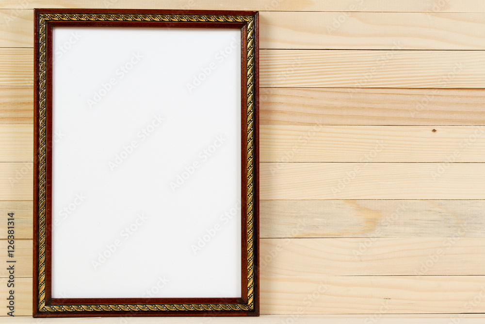 Fototapeta premium Frame on wooden wall. Interior Design. Copy space