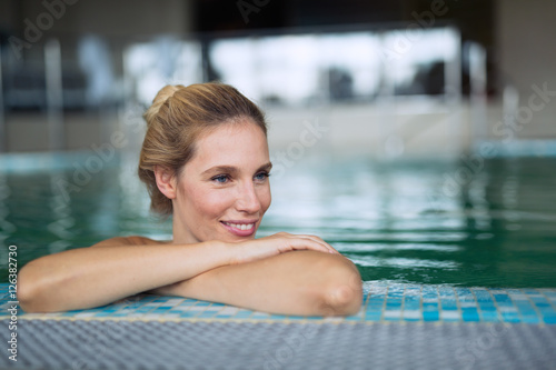 Beautiful woman in spa pool