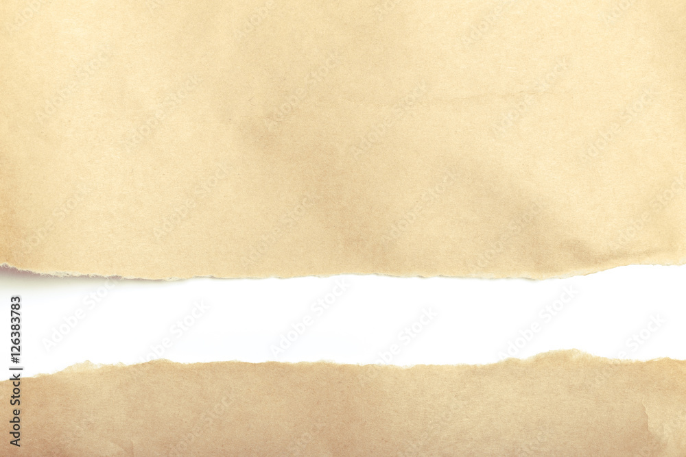 Brown package paper torn to reveal white panel