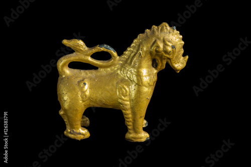 Lion ancient statue - Golden lion statue in Thai style with isol
