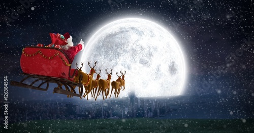 Fotografie, Obraz Composite image of santa claus riding on sleigh with gift box