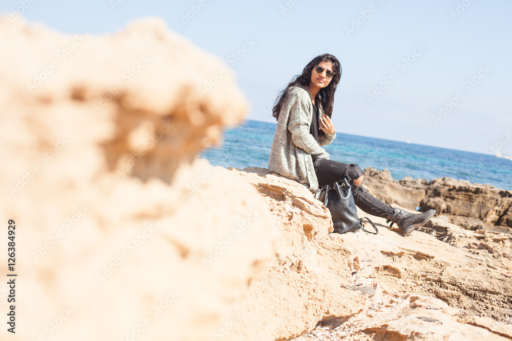 Fototapeta premium young woman smiling in the beach