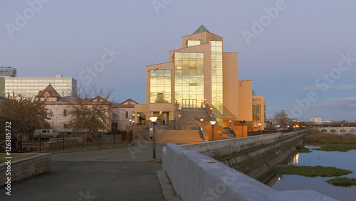 Modern and ancient buildings on the waterfront of the city.Chelyabinsk.