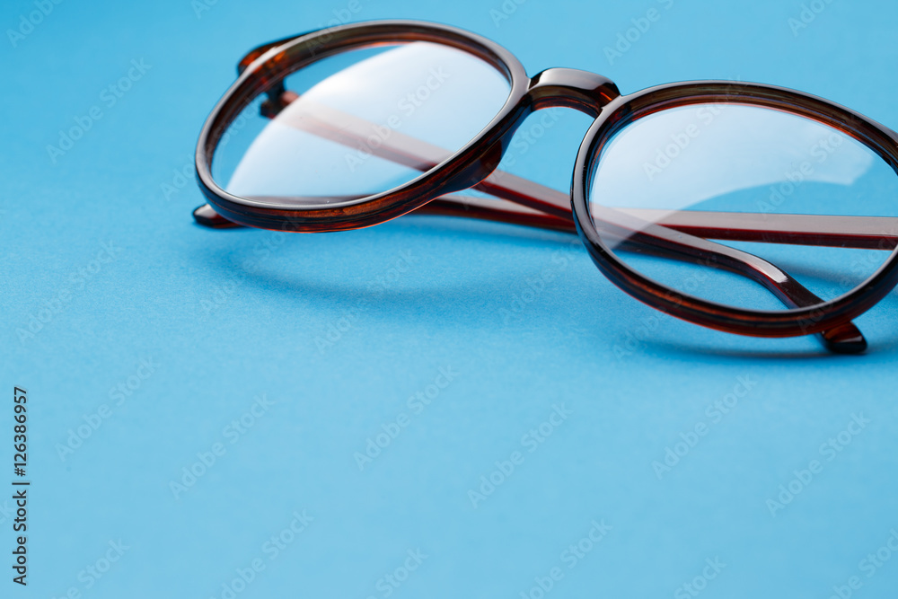 Folded round glasses close up Folded round glasses close up