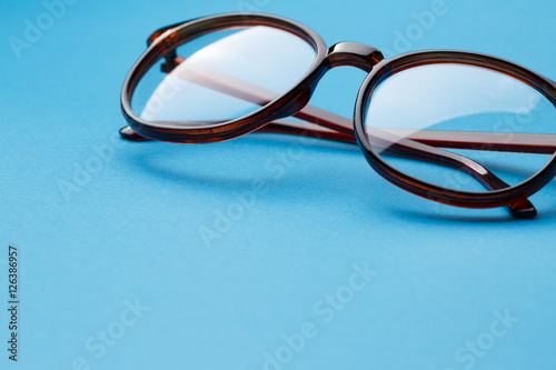 Folded round glasses close up