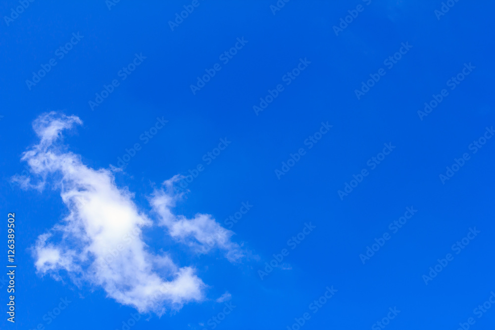 Blue sky background with white clouds. The vast blue sky and clouds sky on sunny day. White fluffy clouds in the blue sky. Blue sky background with white clouds. The vast blue sky and clouds sky on sunny day. White fluffy clouds in the blue sky.