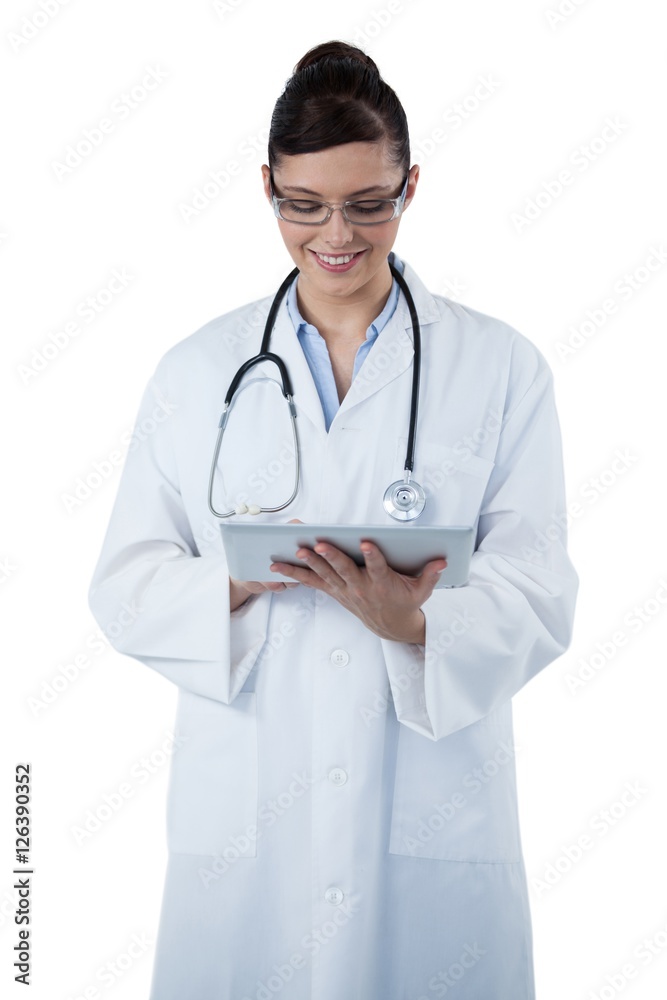 Beautiful female doctor using digital tablet Beautiful female doctor using digital tablet