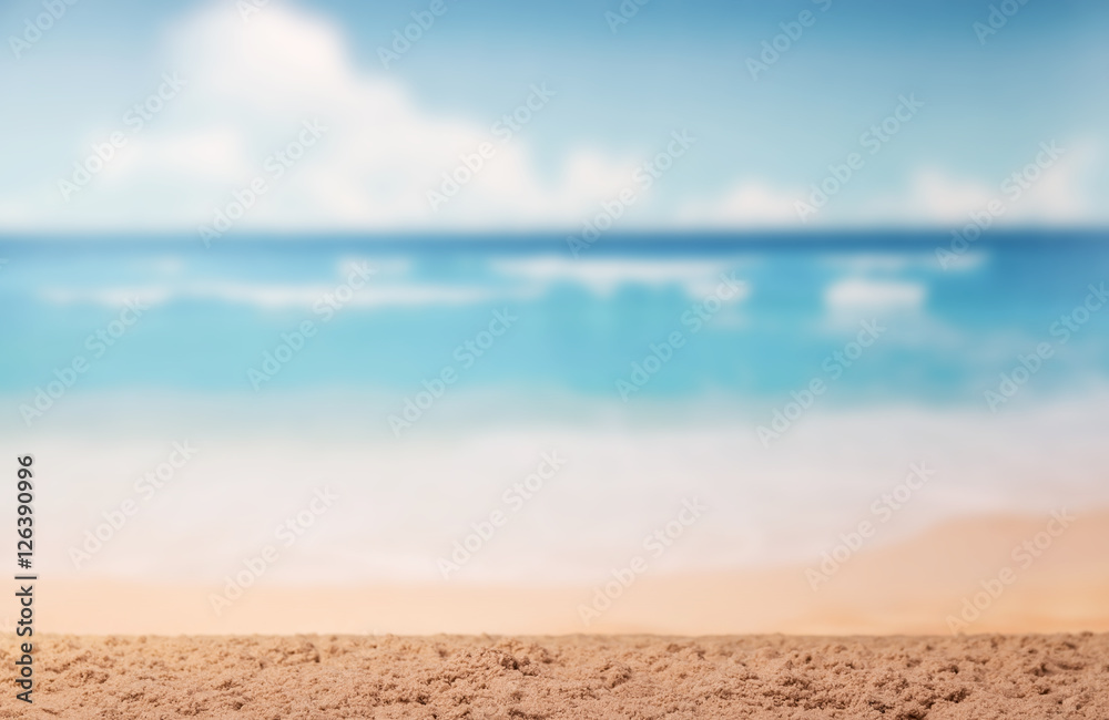 Beautiful seascape, sand, beach on background of blue sky.