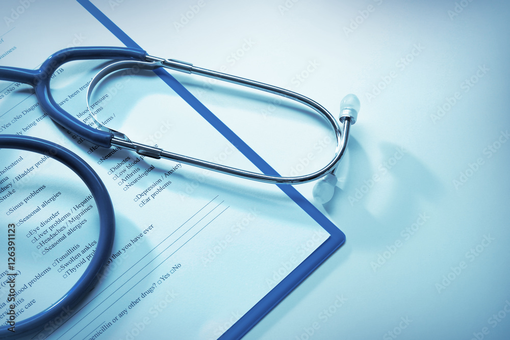 Stethoscope and patient medical history Stethoscope and patient medical history