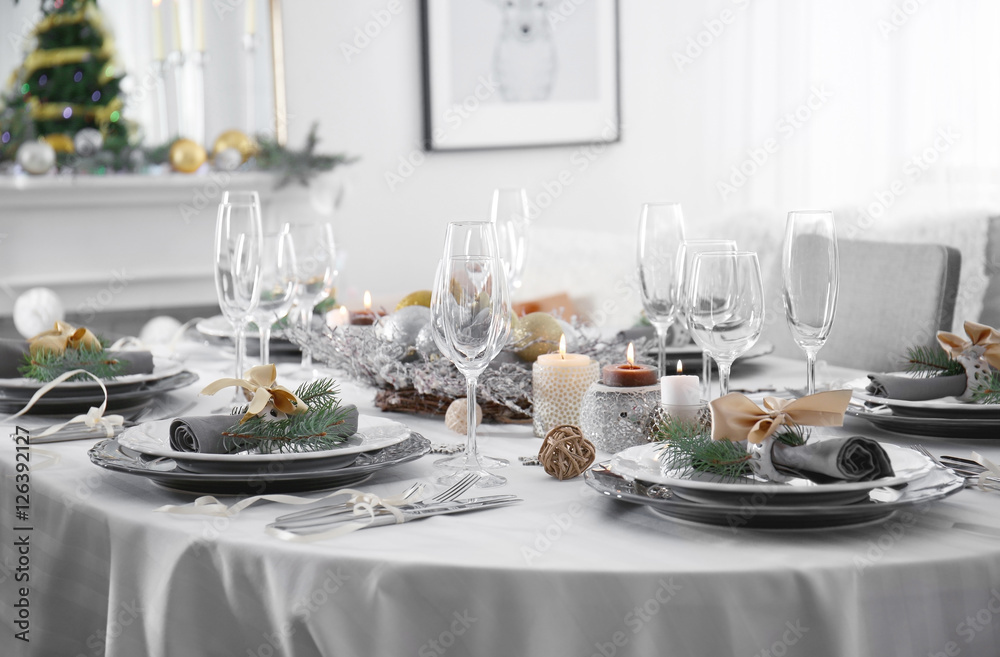 Table served for Christmas dinner in living room