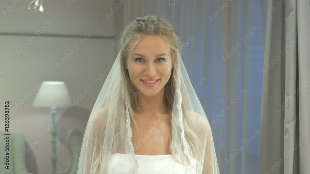 Beautiful bride in the wedding boutique Beautiful bride in the wedding boutique