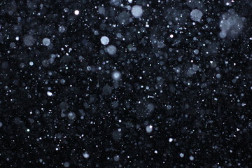 Real falling snow on a black background for use as a texture layer in your project. Add as "Lighten" Layer in Photoshop to add falling snow to any image. Adjust opacity to taste. 