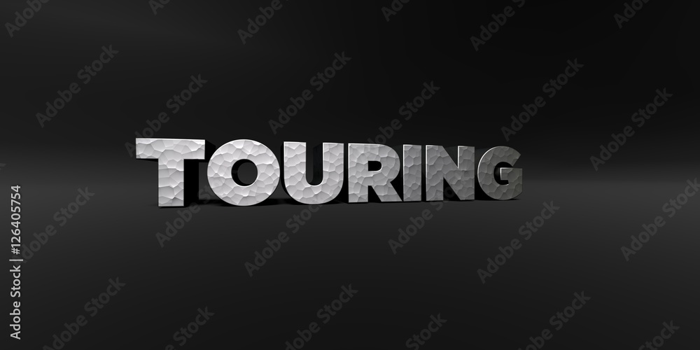Fototapeta premium TOURING - hammered metal finish text on black studio - 3D rendered royalty free stock photo. This image can be used for an online website banner ad or a print postcard.