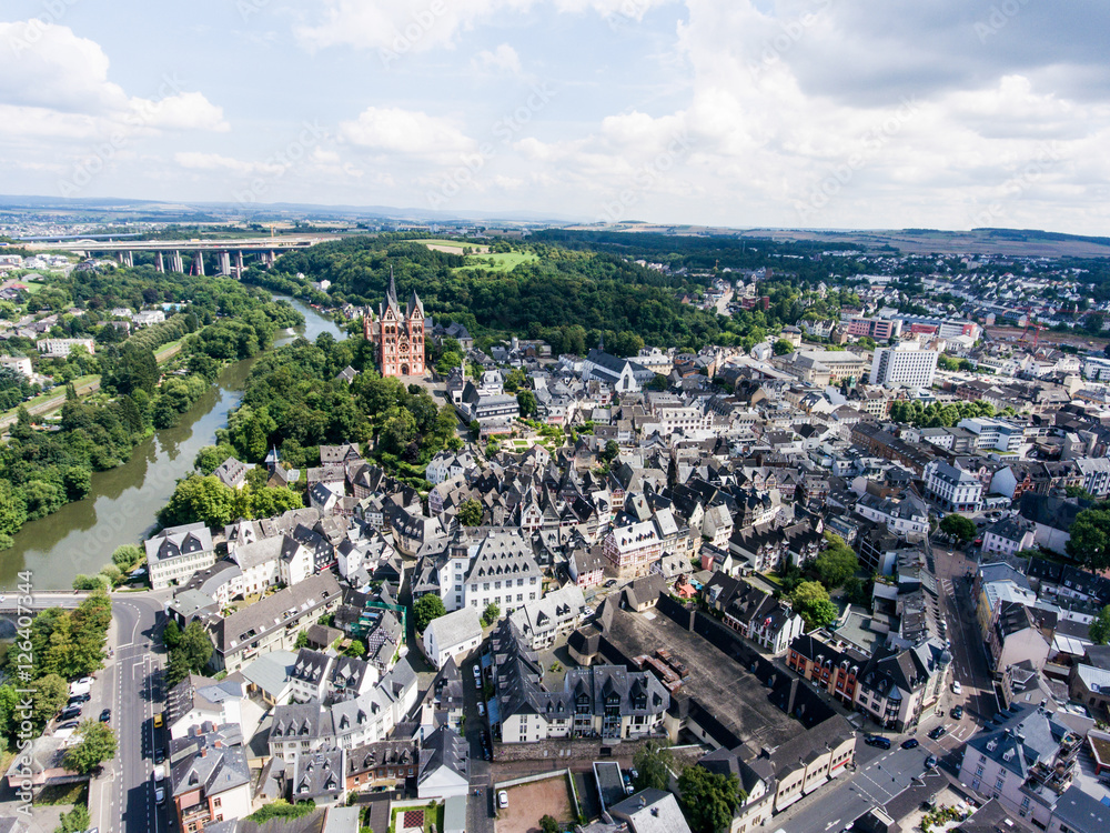 Aerial view of Dutch town, church, river, bridge, white building