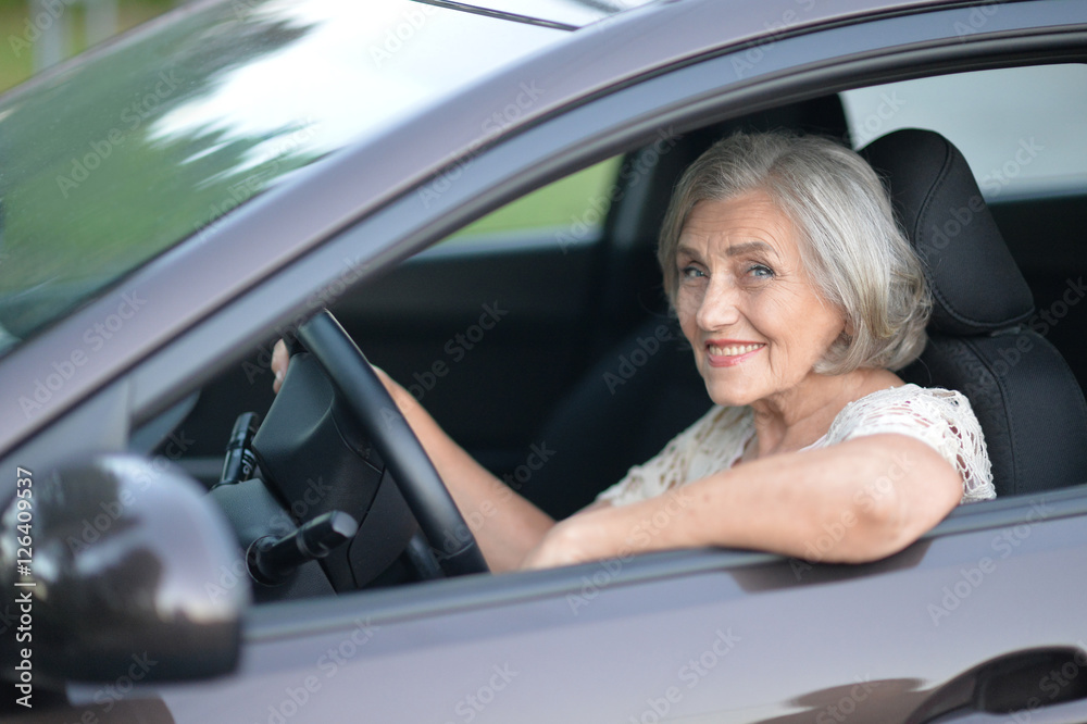 Senior Woman Driving Car