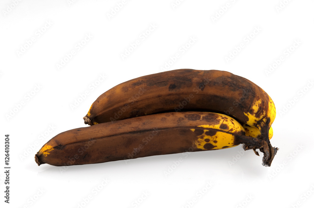 brown overripe bananas on white background brown overripe bananas on white background
