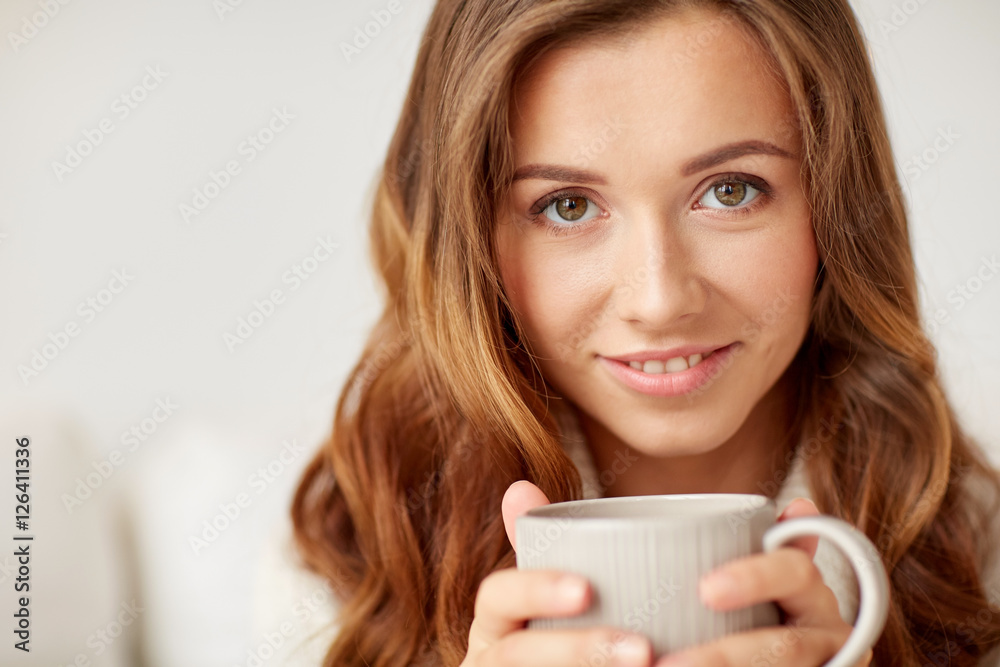close up of happy woman with coffee cup at home close up of happy woman with coffee cup at home