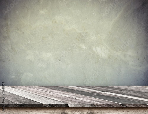 Empty wood plank table top with grunge concrete wall,Mock up for