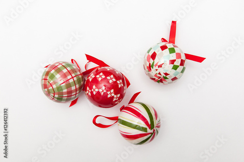 decorations of christmas tree, colorful balls and snowman on white backgrounds photo