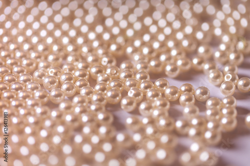 Background of pearl beads close-up.