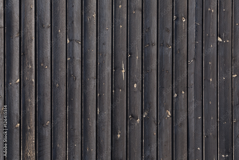 Black outdoor wooden wall, background texture Black outdoor wooden wall, background texture