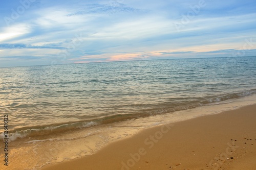 Fototapeta Naklejka Na Ścianę i Meble -  Sunrise  Sea water and beach and sky. Cold Warm Filter look Colorful