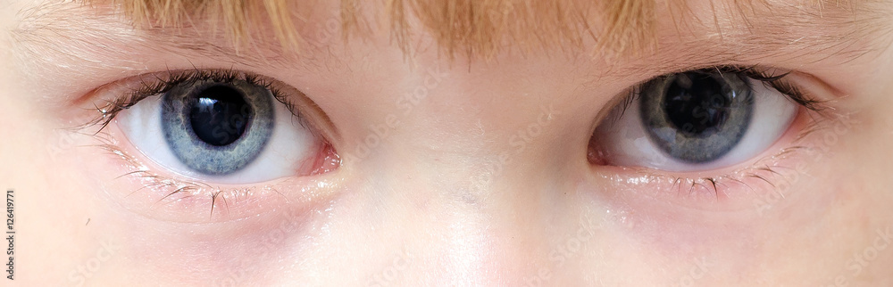 Naklejka premium small child's eyes close up