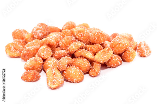 Bunch of peanuts with honey isolated on white