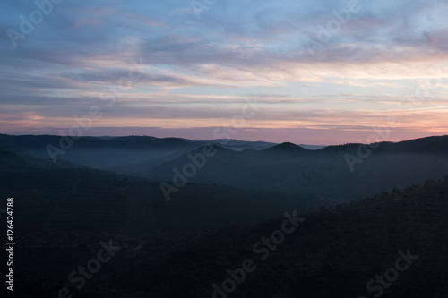Fototapeta Naklejka Na Ścianę i Meble -  Foggy hills in the morning