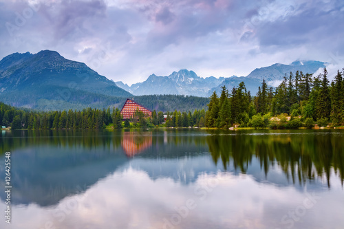 Breathtaking mountain views and a quiet lake. © Vitalii_Mamchuk