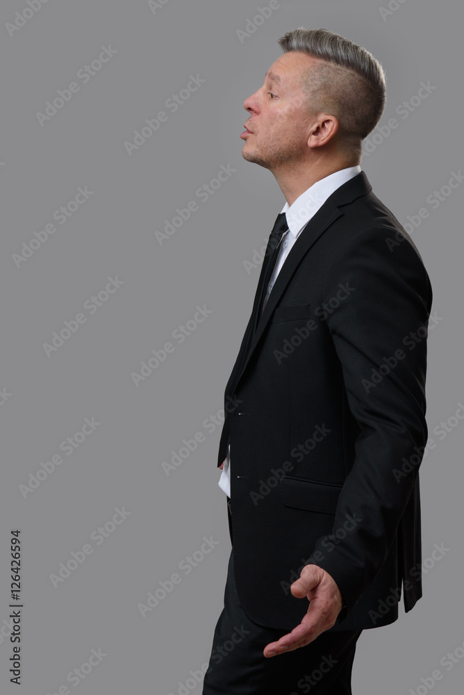 Senior business man talking with someone. Senior business man talking with someone.