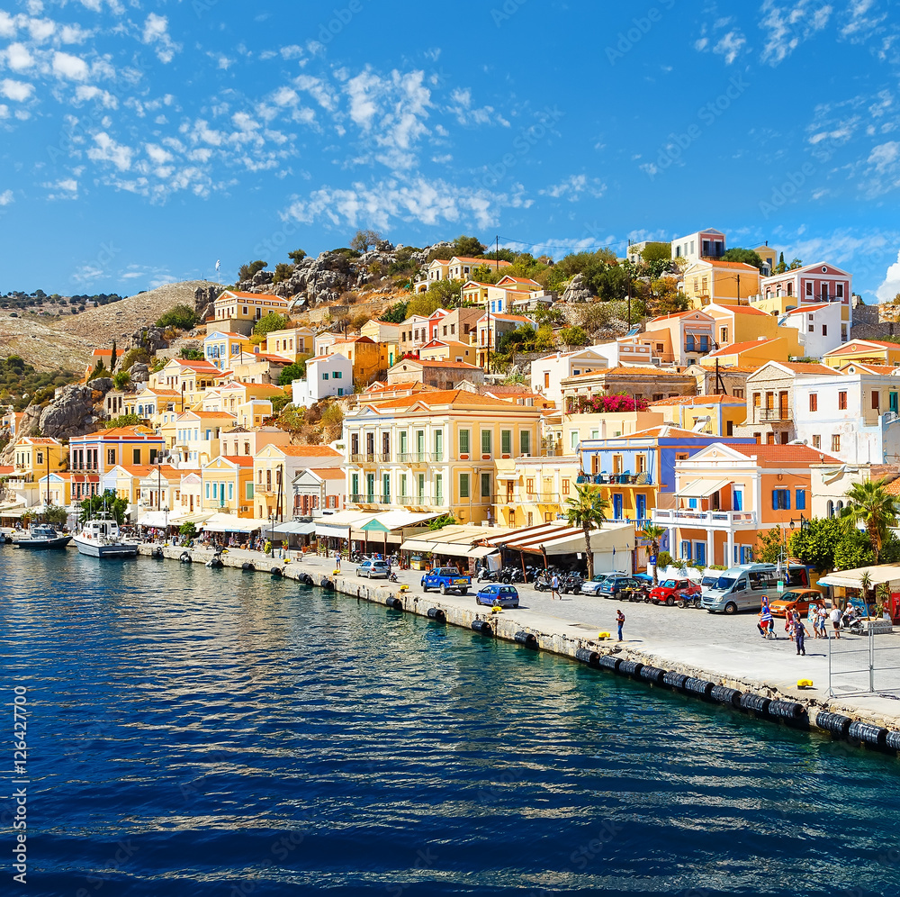 Greece. Dodecanesse. Island Symi Simi . Colorful houses on the rocks