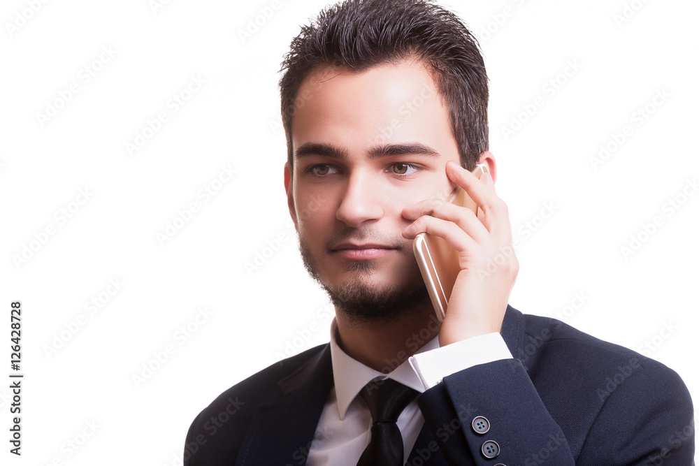 Businessman talking on the phone isolated on white background Businessman talking on the phone isolated on white background