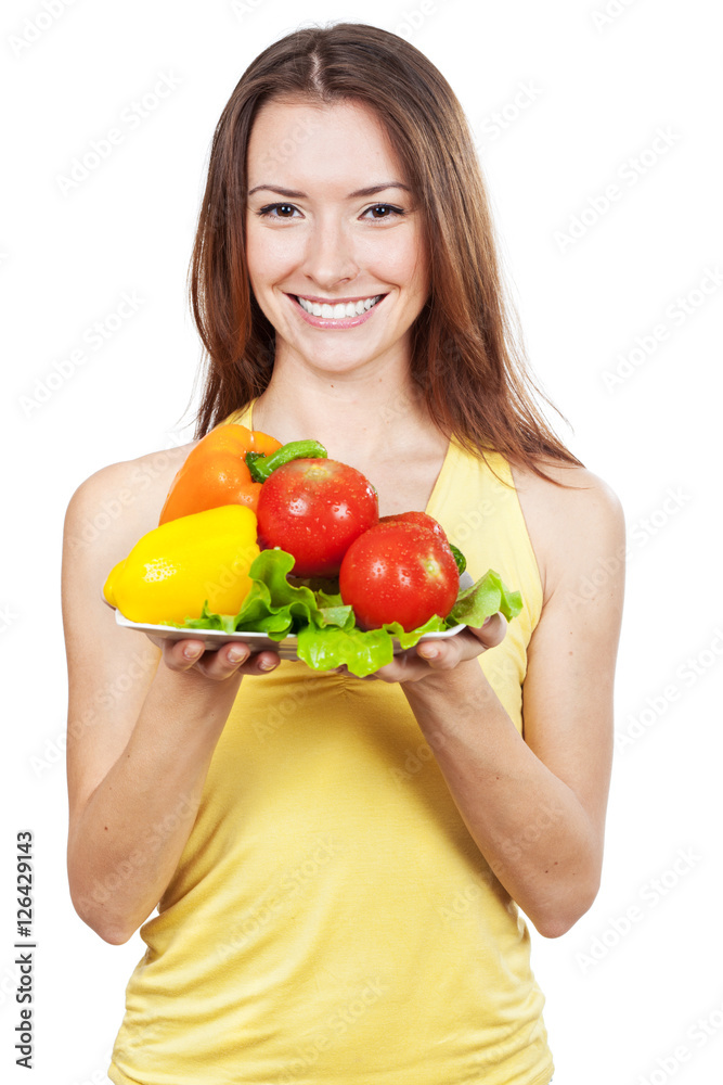 woman holding plate of fresh vegetables woman holding plate of fresh vegetables