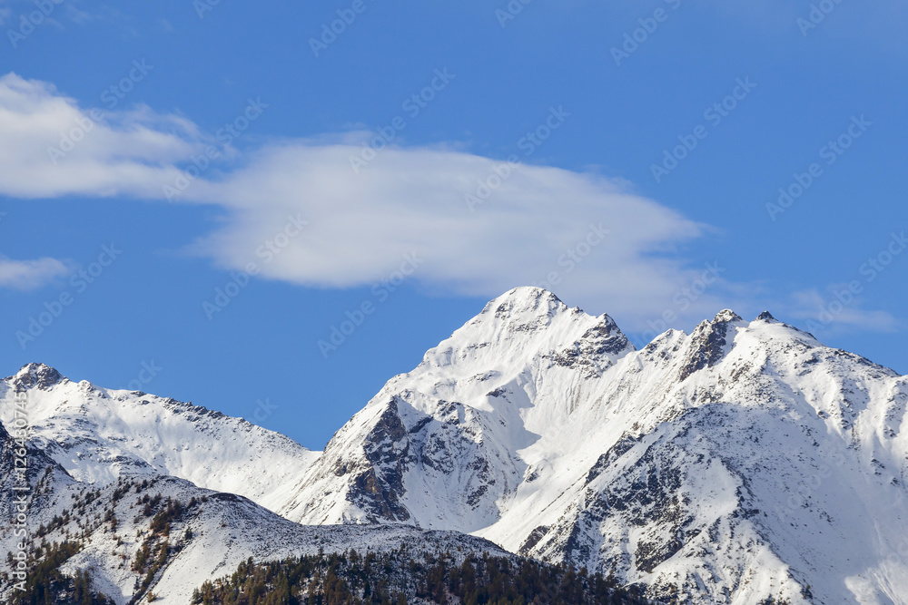 High snowcapped mountain peak