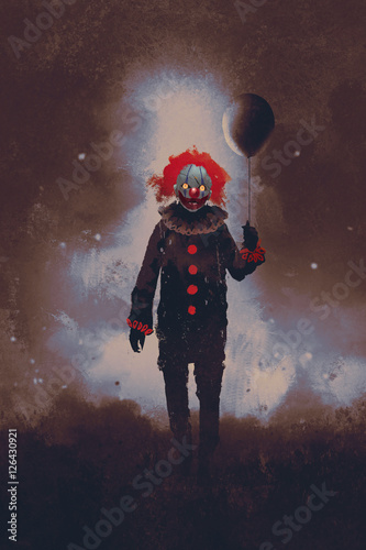 Tablou canvas evil clown standing with a black balloon against a dark background,illustration