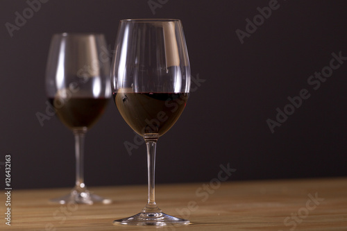 Glasses of red wine placed on the table