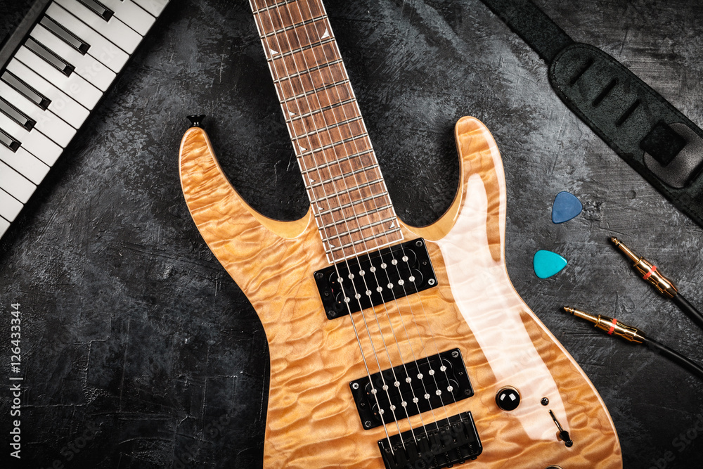 Fototapeta premium Electric guitar on grey background