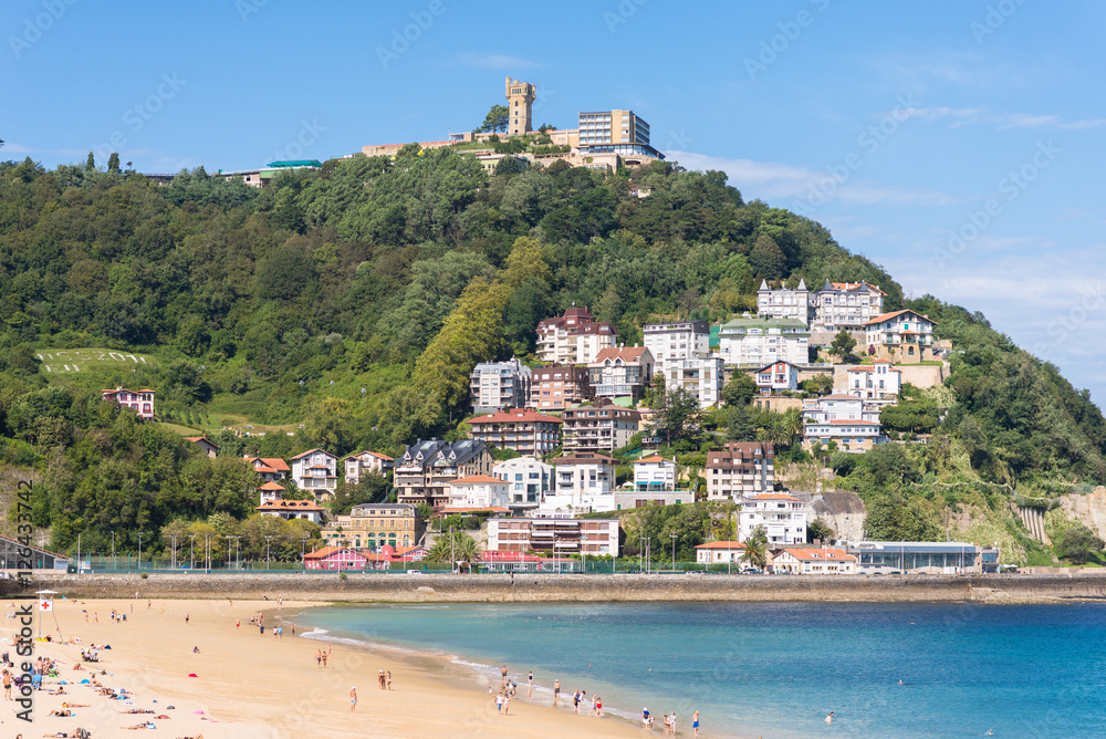 Fototapeta premium View of Igeldo, a district of San Sebastian. It is a small town located on the hill of the same name, overlooking the western side of the Bay of La Concha, one of the most famous urban beaches