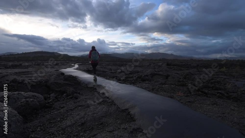 Hiker Backpacker on a Cave trail Craters of The Moon National Monument Idaho