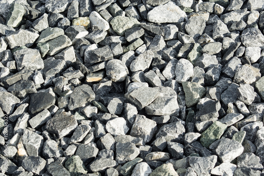 Grey rocks in the evening light. Pavement for laying asphalt. Grey rocks in the evening light. Pavement for laying asphalt.